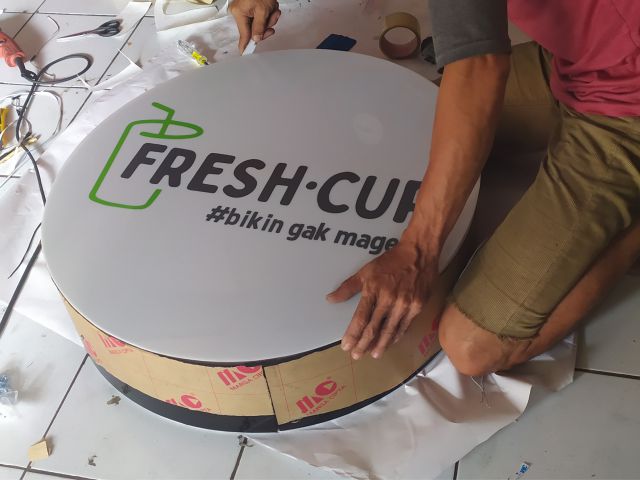 neon box bulat depok
